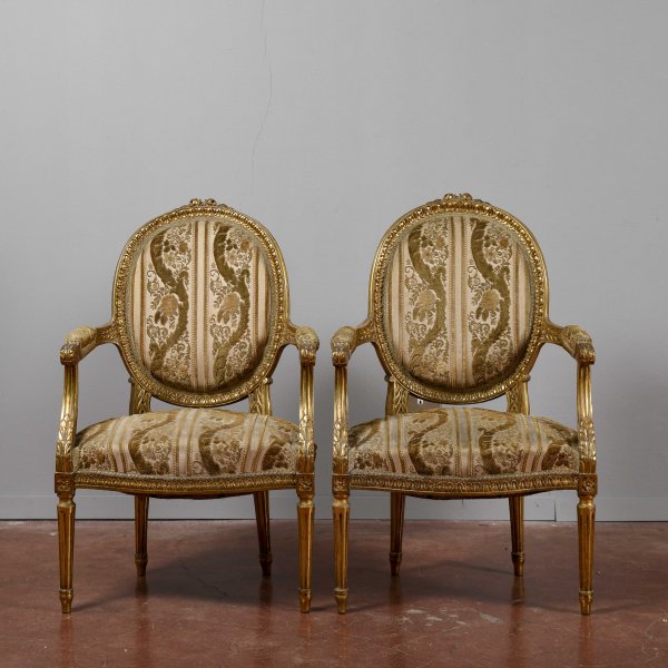 Coppia di poltrone dorate stile Napoleone III